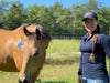 Rebecca Haddock, worlds expert in equine kinesiology taping, and her gelding "Bug" finishing up after a long day filming.