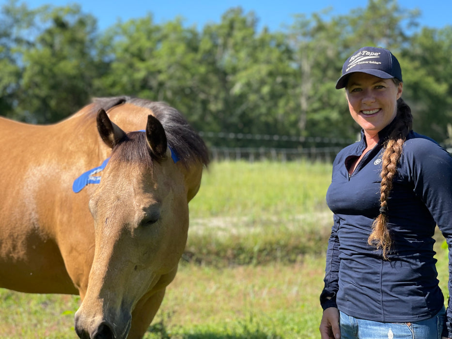 Rebecca Haddock, worlds expert in equine kinesiology taping, and her gelding "Bug" finishing up after a long day filming.