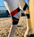 Equi-Tape Application of equine kinesiology tape for horse's hock. Use this application to support and stabilize the hock after surgery, joint injections, injuries and dysfunctions like bone spavi, thoroughpin, capped hocks, sprains, tears, inflammation, swelling and more. Equi-Tape is clinically prove to help hock, no side effects, no active ingredient, safe for you and your horse. 